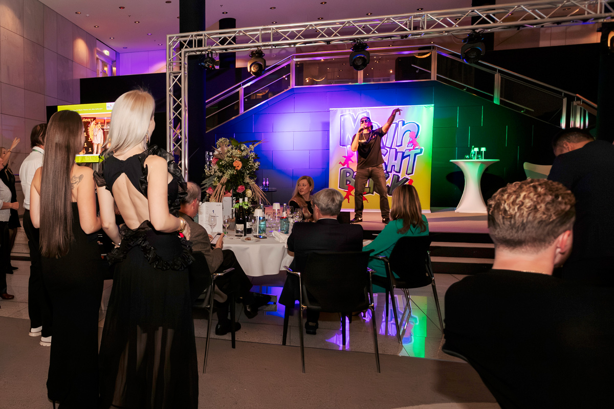 The event continued with a musical performance by singer Dante Thomas
